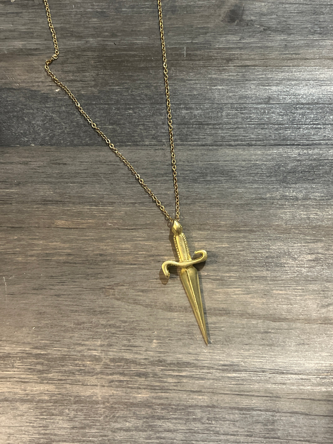 Gold sword necklace