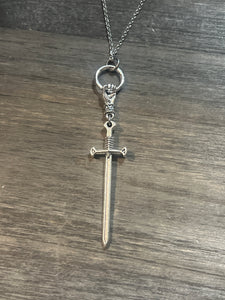 Hand and sword necklace