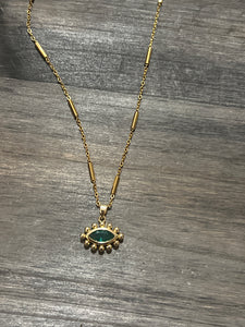 Green eye necklace