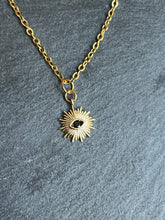 Load image into Gallery viewer, Gold plated Brass sun and black eye necklace
