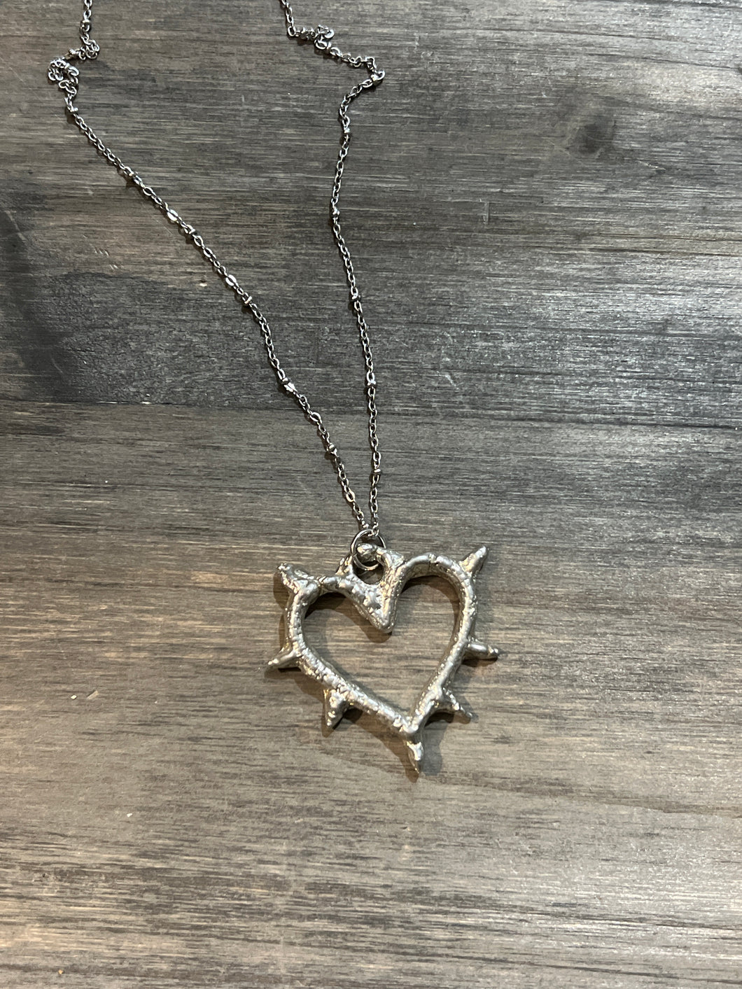 Large spike heart necklace