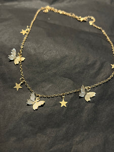 Butterfly star charm necklace