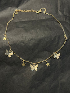 Butterfly star charm necklace