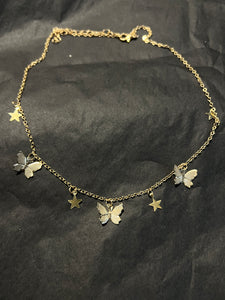 Butterfly star charm necklace