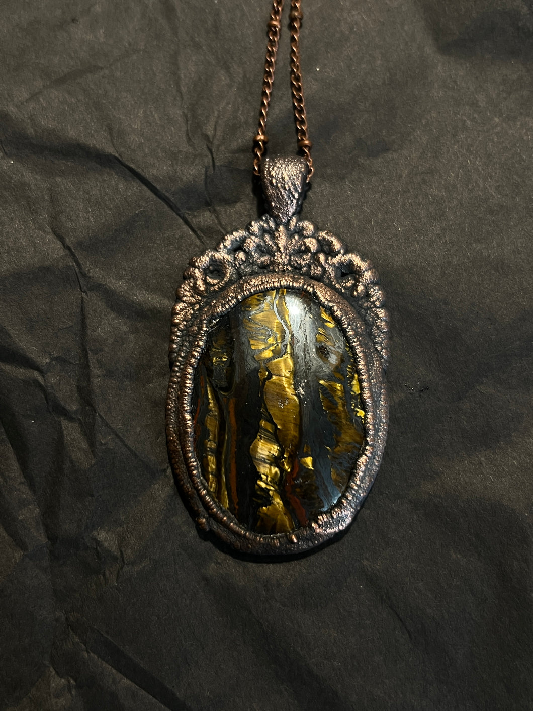 Copper electroformed ornate tiger iron necklace